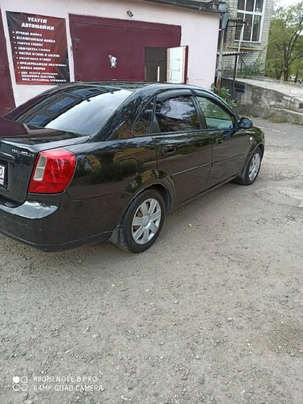 Продам chevrolet нубира 2004 года выпуска, комплектация sx, в отличном состоянии мотор 1.8 в комплектации с гур, кондиционер, передние стеклоподъемники, пробег 156,полностью обслужена, два комплекта резины, цена 520 торг, +79494182794 📞 звоните: +7(949)4182794 - фотография - 5