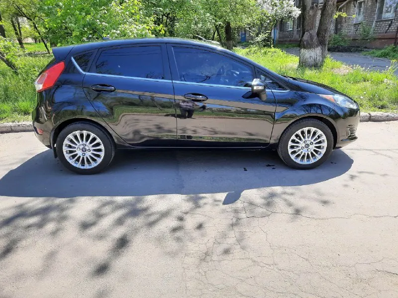 Ford fiesta 1.6 titanium (usa) цена: 720 000 город: мариуполь год выпуска: 2013 пробег: 188 000км двигатель: 1.6 топливо: бензин кпп: автомат собственник: да телефон: +79497089848 описание от продавца максимальная комплектация: кнопка старт-стоп, бесключевой доступ, кожаный салон, климат контроль, большая сенсорная мультимедиа, мультируль, гур, штатная многоцветная подсветка салона, подогрев зеркал, подогрев сидений и заднего стекла, 4 эл. стеклоподъемника, эксклюзивные диски r16, камера заднего вида, парктроники. делаю сразу скидку в 20к, нужно позаниматься (нет времени) по блоку тсм (периодически выдает ошибку), машина на ходу. - фотография - 2