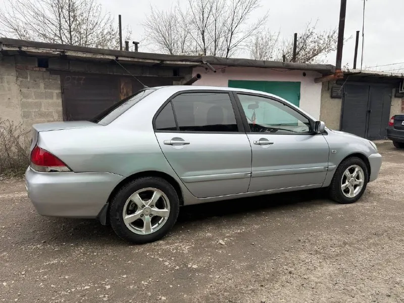 Продам mitsubishi lanser 9!2007 г. в. 1.6 механика!по технической части автомобиль без вопросов, на ходу каждый день!стоит хорошая зимняя резина, стоит андроид магнитола,4эсп(рабочих), состояние как на фото(есть нюансы, дно не выпадает, стаканы все целые)!машина не новая!документы в полном порядке!осмотр макеевка!цена 340000руб. остальные вопросы по +79493633561 +telegram 📞 звоните: +7(949)3633561 - фотография - 2
