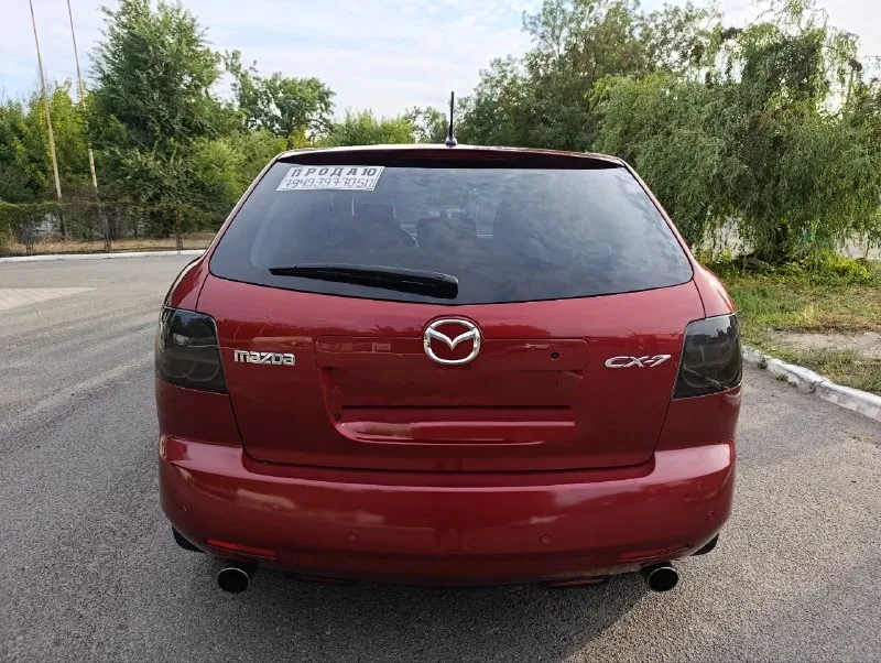 Продам mazda cx-7 2008г. 2.3 (бензин) 4 wd (европейской сборки). пробег: 250.000 6 ст. обычный японский автомат. я хозяин по тп 180 регион. максимальная комплектация: без ключ доступ, кожа, люк, климат контроль, парктроник, подогрев сидений, полный электро пакет, датчик света и дождя, новая дорогая оптика, новая летняя резина, заменён новый комплект грм, новый компрессор кондиционера и многое другое. денег на машину не жалел, машина ухожена. двигатель работает отлично, коробка не пинает, не толкает, не дёргает. по кузову всё нормально. цена:1300 000 торг донецк все вопросы по телефону 7949-397-70-50 📲 tg: екатерина болли 📞 звоните: +7(949)3977050 - фотография - 2