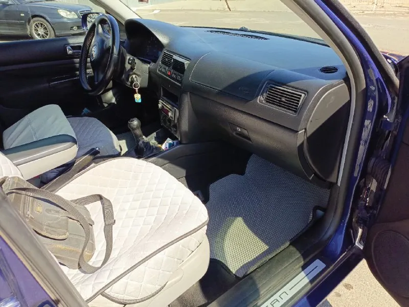 Гольф iv универсал, 2005 г. в., 242 тыс. км. двигатель 1.6 (16 кл. «всв»), бензин-газ (зарегистрирован), своевременное обслуживание. в 2021 пригнан из германии, один хозяин. все стекла заводские, зазоры в идеале, не бит, не крашен, масло не доливаю. отличная акустика, комплект зимних шин на дисках очень надежный, практичный и экономичный автомобиль. салон с фв-бора, родной в подарок. есть нюансы по кузову, но детали есть, некогда заниматься. 560 т. р. мариуполь. +7949-706-37-47 - фотография - 5