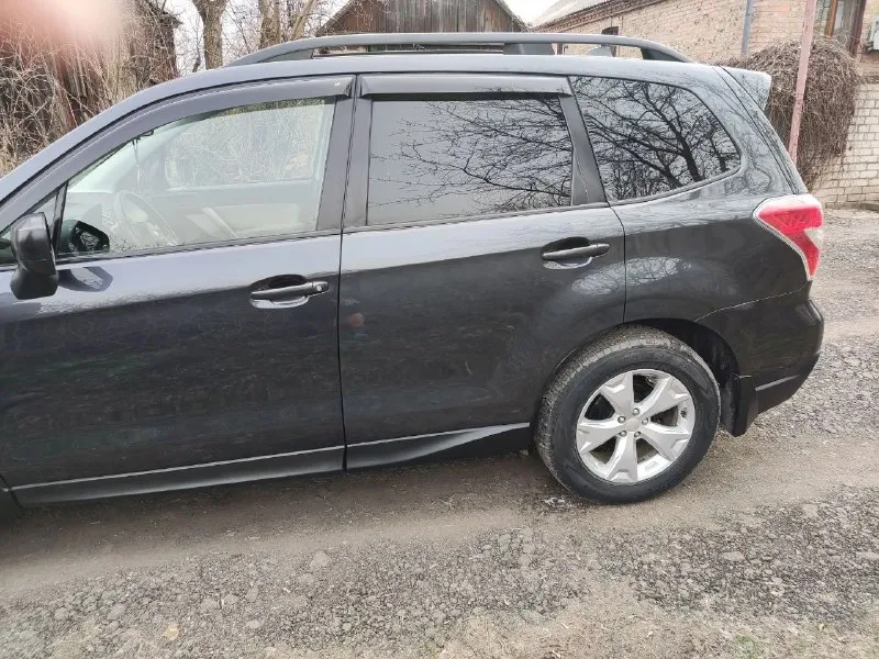 Продам subaru forester. объем 2.5 двигатель атмосферник ( 170л. сил), полный привод рестайлинг 2015 г. по америке. коробка вариатор, пробег 110 миль/ 160 тыс. км. авто владею с 2023 года, в ноябре заменил тормозные колодки и масло в двигателе. достойное состояние всего автомобиля. летняя резина в комплекте. цена 1,8 млн руб. телефон +79493754315 📞 звоните: +7(949)3754315 - фотография - 3