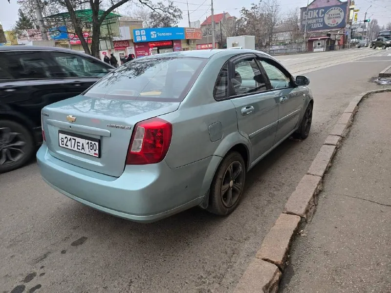 Продам chevrolet лачетти cdx, мотор 1.8, коробка автомат. год 2006, куплен в автосалоне, пробег 142... - фотография