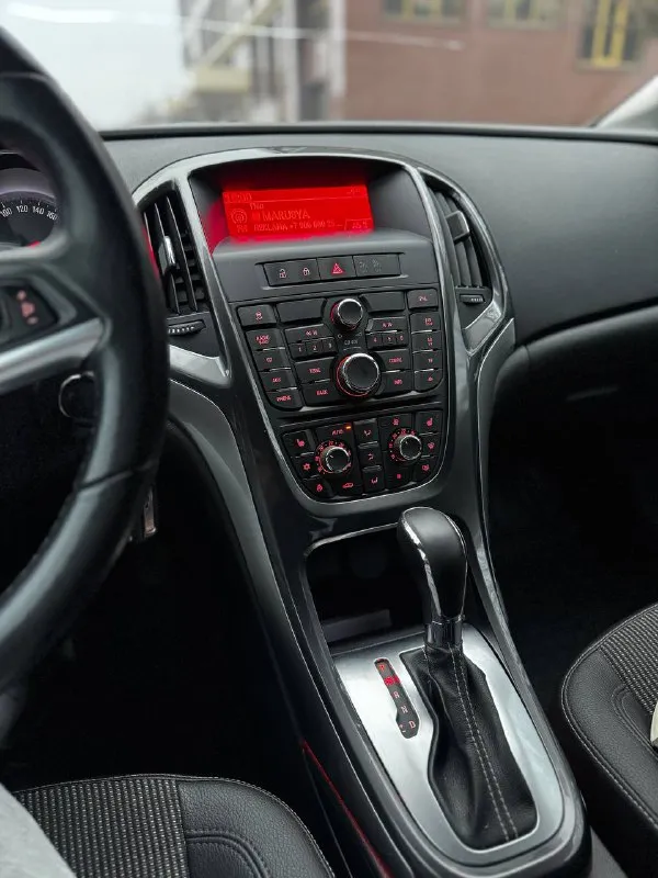 Opel astra j cosmo 1.6 at 2012 г. в авто в идеальном состоянии салон как в новом автомобиле одна владелеца 12 лет оригинальный пробег 140 т. км богатая комплектация подогревы сидений/руля/зеркал/форсунок омывателя двухзонный климат-контроль хорошая штатная музыка круиз-контроль комбинированный салон кожа/ткань электро ручник штатная амбиентная подсветка сделано то цена 870 т. рублей торг у капота звоните +79495082418 тг вотсап +79493811593 николай 📲 tg: @kloyastarlink 📞 звоните: +7(949)5082418 - фотография - 10