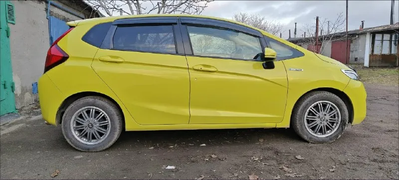 ⚡продам срочно!!!⚡ 💥по низу рынка❗💥 💫honda fit 2014 год, 1,5 бензин (гибрид), автомат, передний привод, 195 тыс пробег. авто в отличном состоянии, чистокровный японец, в машине работает всё! ✅климат, без ключевой доступ, старт/стоп, 4эл. стеклоподъёмника, мультируль, головное устройство android с навигацией, режим eko, 2 ключа, свежая резина на дисках. ✅выглядит очень хорошо, салон не затертый, кузов без рыжиков. очень динамичный и экономичный авто, расход по паспорту 3л/100, разгон 8,4 сек. 🚀 переоформление без проблем, могу присутствовать в мрэо. цена 850тыс. руб. хорошим людям, хороший торг. тел: +79496849154 📞 звоните: +7(949)6849154 - фотография - 4