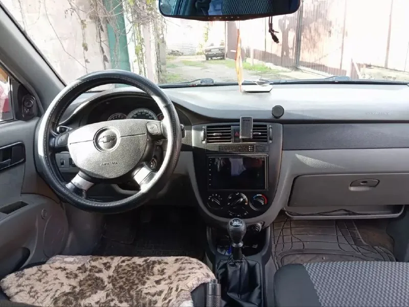 Продам лачетти 2007 год двигатель 1.8 газ бензин мкпп пробег 144 т в хорошем состоянии цена 530т в р... - фотография