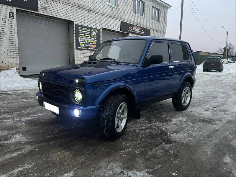 Продам ваз нива 2011 год в отличном состоянии коробка роздатки мосты все на 5 + едит очень хорошо по... - фотография