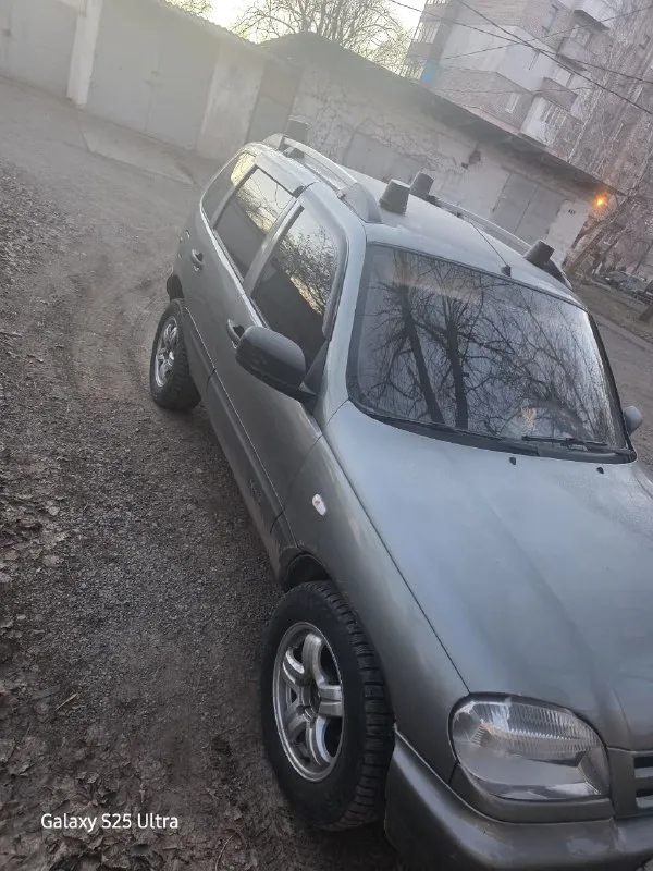 Нива chevrolet 2007 год пробег 357 708 цена 415 000 торг автомобиль обслужен в зиму. за машину не ст... - фотография