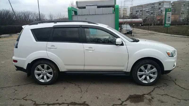 Mitsubishi оутландер xl рестайлинг 2011г. в 2,4л 220т. км 4wd климат контроль. 4 эсп датчик света. подогрев сидений. климат контроль. кожаный салон. мультимедиа. камера заднего вида. сигнализация с обратной связью. установлены новые дхо 2-х режимные. сделана качественная шумоизоляция дверей и багажного отделения, салон кожаный трансформер в хорошем состоянии, эво ковры вплоть до багажника, обслужена выхлопная система (новый не громкий приятный бархатистый выхлоп). резина зима в хорошем состоянии. осмотр г. алчевск цена 1🍋 280тр. т. +79591139030 📞 звоните: +7(959)1139030 - фотография - 4