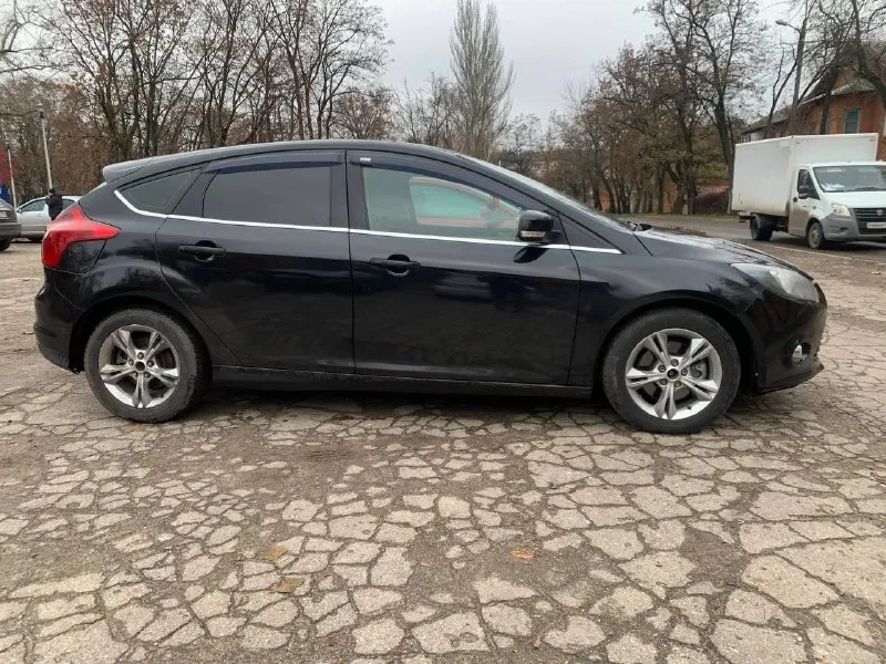 Продам ford focus iii, 2011 г. в. — ухоженный, мощный, готов к поездкам! номера в подарок! · надежный двигатель: 2.0 литра (150 л. с. ) в отличном техническом состоянии. · безупречная акпп: автоматическая коробка передач работает идеально — не пинает, не дергается, не уходит в аварийный режим. · обновленная ходовая: большой объем работ по подвеске выполнен — едет ровно и уверенно. · чистая история: автомобиль не битый, не крашенный, дтп не участвовал. все стекла оригинальные. · отличный экстерьер: кузов в прекрасном состоянии. •хорошая мультимедиа. •2-х зонный климат контроль •5 режимный подогрев сидений основные характеристики: · год выпуска: 2011 · двигатель: 2.0 л (150 л. с. ), бензин цена: 650 000 руб. контакты и осмотр: · телефон: +79493123912 · место осмотра: г. макеевка 📞 звоните: +7(949)3123912 - фотография - 3