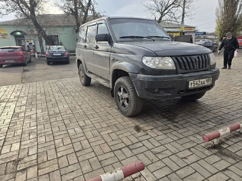 Патриот 2008г в идеальном состоянии, всё работает исправлено, кандер обслужен, резина липучка новая.... - фотография