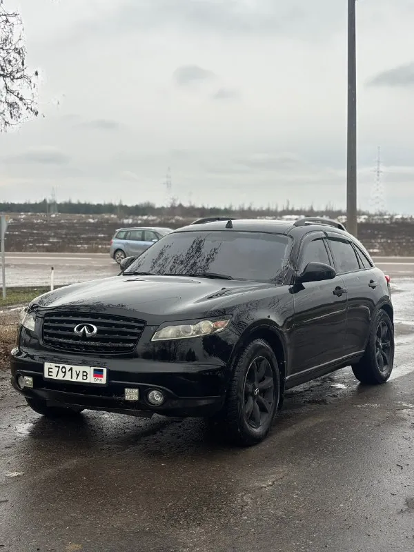 🚙 infiniti fx 35 2004г цена 470 000₽ +7 (949) 527-69-59(вотсап, телеграмм) +7 (949) 377-23-38 на полом боевом ходу, полный привод, мотор коробка в отличном состоянии, мотор контрактный 80 000 пробег, коробка листает очень четко, ходовая часть без вложений, печка жарит, климат-контроль холодит. -новая резина зимняя -тормозные блины, суппорта, колодки все новое -мультимедиа bose -люк работает -лед оптика -бесключевой доступ -камера заднего вида, парктроники лобовое с трещиной, ручка наружная водительская под замену. едет ровно, некуда не тянет, тяга бешеная. машина на временном днр учете. хороший торг у капота. 📍находится в г. амвросиевка 📞 🇷🇺 звоните: +79495276959 - фотография - 2