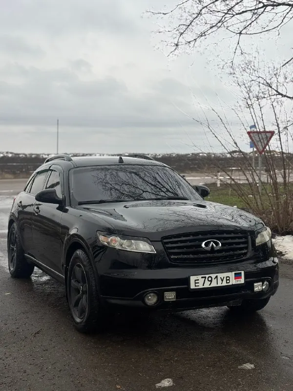 🚙 infiniti fx 35 2004г цена 470 000₽ +7 (949) 527-69-59(вотсап, телеграмм) +7 (949) 377-23-38 на полом боевом ходу, полный привод, мотор коробка в отличном состоянии, мотор контрактный 80 000 пробег, коробка листает очень четко, ходовая часть без вложений, печка жарит, климат-контроль холодит. -новая резина зимняя -тормозные блины, суппорта, колодки все новое -мультимедиа bose -люк работает -лед оптика -бесключевой доступ -камера заднего вида, парктроники лобовое с трещиной, ручка наружная водительская под замену. едет ровно, некуда не тянет, тяга бешеная. машина на временном днр учете. хороший торг у капота. 📍находится в г. амвросиевка 📞 🇷🇺 звоните: +79495276959 - фотография - 5