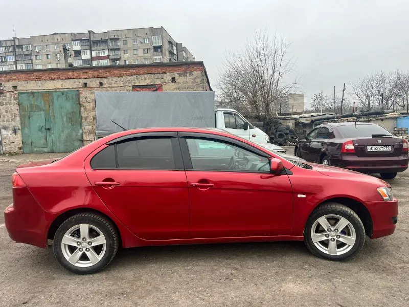 Продам митсубиси лансер x 2008г двигатель 1.8 пробег 233тыс 2 хозяина коробка:акпп двигатель не дымит, масло не ест. акпп не пинает, не буксует, переключает мягко и плавно! ходовая обслужена! новое акб, новые стойки стабилизатора в круг, новые блины передние и колодки передние, новые резинки стабилизатора, новый стартер, новый гидроусилитель руля, новый левый рычаг в сборе, новые стойки передние, новое масло в двигателе и фильтра! по электрике все работает, кондиционер заправлен! комплектация: датчик дождя/света, подогревы передних сидений, климат контроль, сенсорная мультимедиа с камерой заднего вида, сигнализация с автозапуском и обратной связью, эл. подогрев и регулировка зеркал. документы кристально чистые, без запретов, без штрафов, переоформление без проблем цена 680т. р. небольшой торг у капота. г. торез +79493745821 +7 (949) 126-74-52 📞 🇷🇺 звоните: +7(937)4582179 - фотография - 2