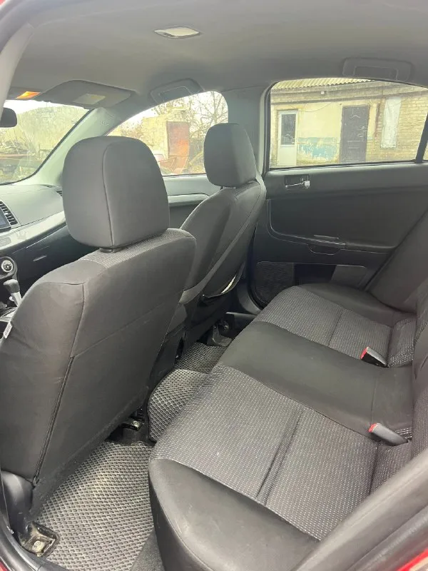 Продам митсубиси лансер x 2008г двигатель 1.8 пробег 233тыс 2 хозяина коробка:акпп двигатель не дымит, масло не ест. акпп не пинает, не буксует, переключает мягко и плавно! ходовая обслужена! новое акб, новые стойки стабилизатора в круг, новые блины передние и колодки передние, новые резинки стабилизатора, новый стартер, новый гидроусилитель руля, новый левый рычаг в сборе, новые стойки передние, новое масло в двигателе и фильтра! по электрике все работает, кондиционер заправлен! комплектация: датчик дождя/света, подогревы передних сидений, климат контроль, сенсорная мультимедиа с камерой заднего вида, сигнализация с автозапуском и обратной связью, эл. подогрев и регулировка зеркал. документы кристально чистые, без запретов, без штрафов, переоформление без проблем цена 680т. р. небольшой торг у капота. г. торез +79493745821 +7 (949) 126-74-52 📞 🇷🇺 звоните: +7(937)4582179 - фотография - 5