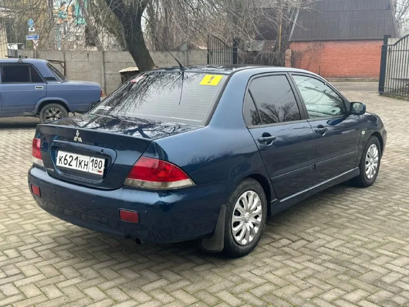 Mitsubishi лансер 9 2004 года двигатель 1.6 коропка ат не димит масло не расходует карапка работает в штатном рижыме ходовая часть опслужена без постороних звуков машына едит бодро и приятно печка грет потдогрев сидений работает цена 550.000 р, торг номер ☎️ + 7 949-431-04-65 📞 звоните: +7(949)4310465 - фотография - 5
