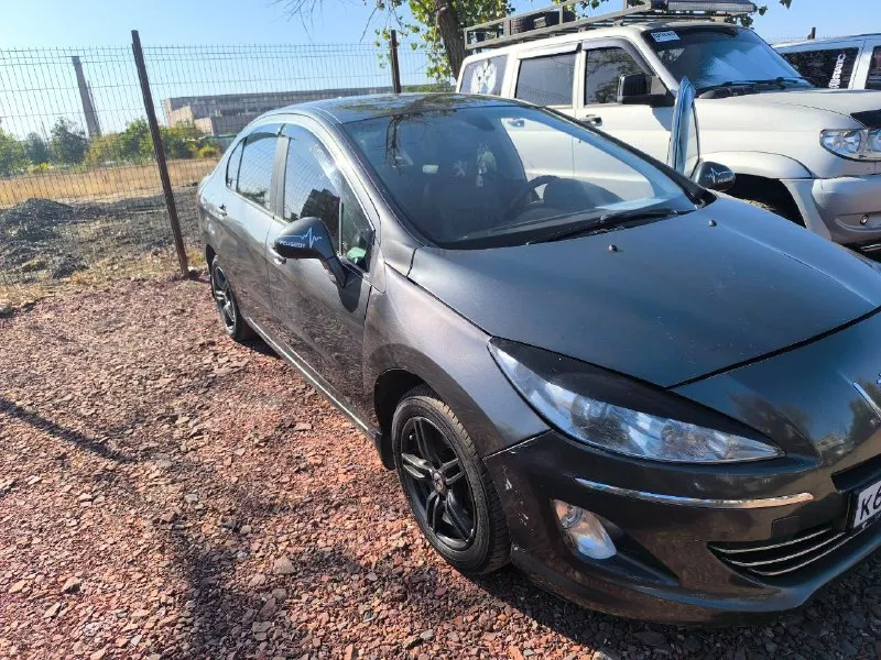 Продам peugeot 408 2013 г. в пробег 250 тыс 1.6.120 л. с коробка автомат 2 комплекта резины старт-ст... - фотография