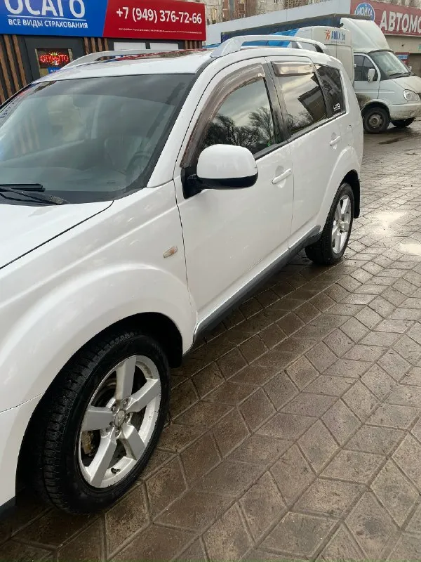 Продам mitsubishi аутлендер 2008,2.4,стоит новая резина, аккумулятор, масла с фильтрами менял недавно, оптика переделана, свет отличный, ксенон, сигнализация с автозапуском, ходовую полностью выкатывали и меняли, перед и зад, масло не ест совсем, климат, люк, все работает, в собственности у меня 3 года, есть моменты по аркам. цена 1100000р, ,,+79494768071 📞 звоните: +7(949)4768071 - фотография - 2