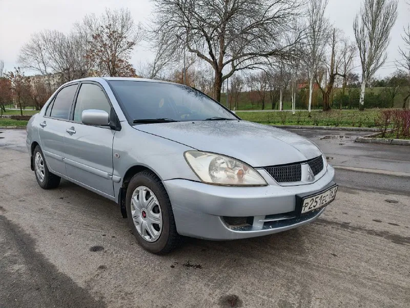 Продам mitsubishi лансер 9 mitsubishi lancer 9 год 2006 двигатель 1.6 работает отлично, масло не ест не дымит, обороты четко 👌 кпп четко без хрустов и вылетов ручник исправен, что должно работать работает кузов в хорошем состоянии, дно пороги целые резина отличная зима + лето переоформление без проблем мариуполь цена 479к торг +79498162933 📲 tg: @bitch_monk 📞 звоните: +7(949)8162933 - фотография - 2