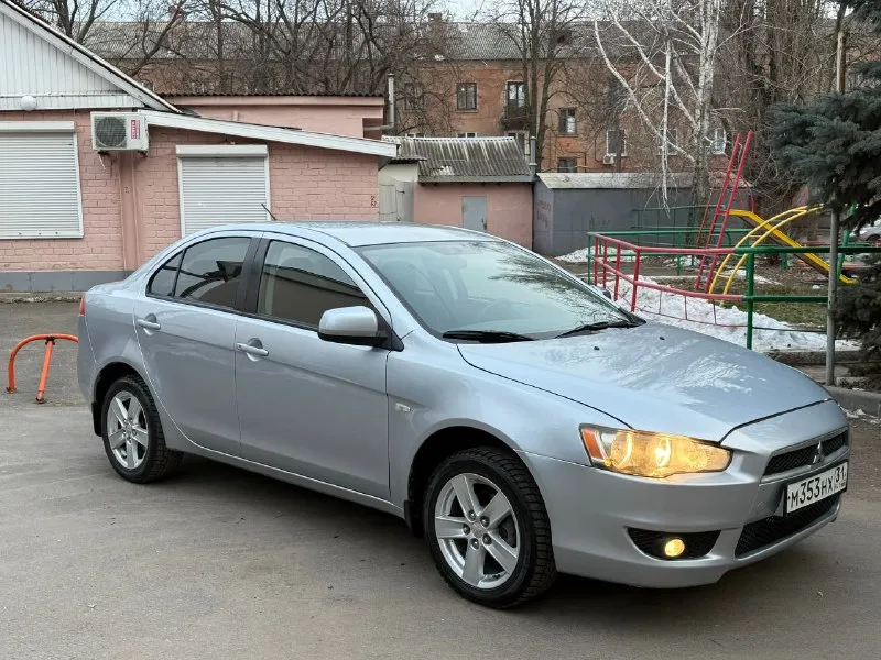 Продам mitsubishi lancer x 1.8 автомат авто в изумительном состоянии родной пробег 159 тысяч! один хозяин за всё время!! год 2009 без дтп в родном окрасе кузов без сколов и тд машина хранилась в теплом и сухом гараже! двигатель коробка ходовая в отличном состоянии максимальная комплектация под рулевые лепестки два комплекта колёс зима/лето сигнализация с автозапуском два ключа и многое другое цена 760 тыс рублей!! из за срочности +79495323651 +79496208155 - фотография - 3