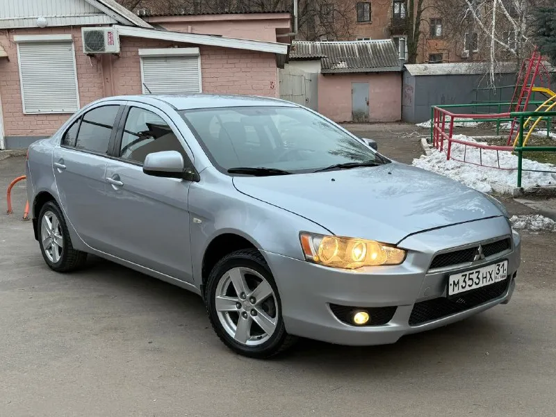 Продам mitsubishi lancer x 1.8 автомат авто в изумительном состоянии родной пробег 159 тысяч! один хозяин за всё время!! год 2009 без дтп в родном окрасе кузов без сколов и тд машина хранилась в теплом и сухом гараже! двигатель коробка ходовая в отличном состоянии максимальная комплектация под рулевые лепестки два комплекта колёс зима/лето сигнализация с автозапуском два ключа и многое другое цена 760 тыс рублей!! из за срочности +79495323651 +79496208155 - фотография - 4