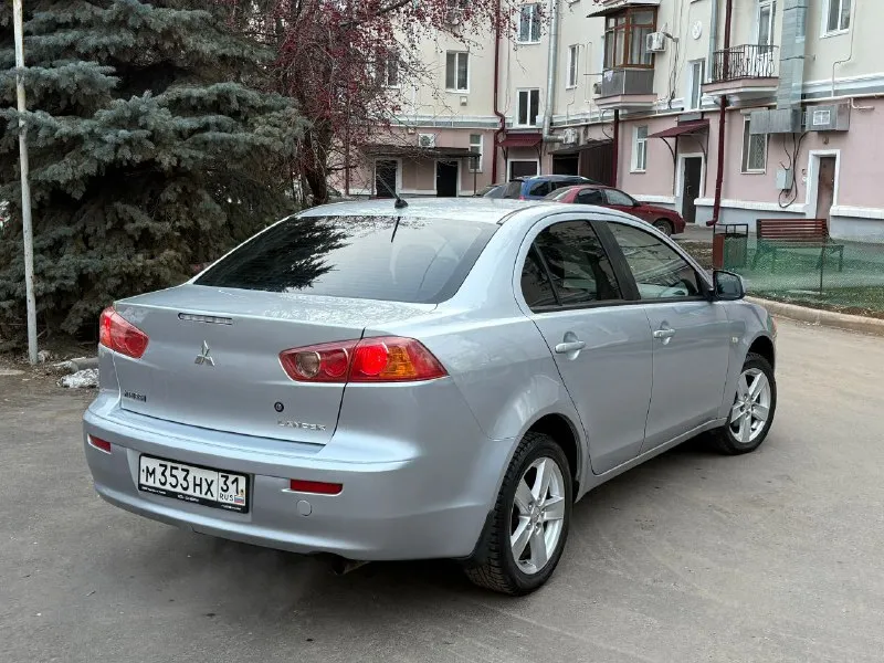 Продам mitsubishi lancer x 1.8 автомат авто в изумительном состоянии родной пробег 159 тысяч! один хозяин за всё время!! год 2009 без дтп в родном окрасе кузов без сколов и тд машина хранилась в теплом и сухом гараже! двигатель коробка ходовая в отличном состоянии максимальная комплектация под рулевые лепестки два комплекта колёс зима/лето сигнализация с автозапуском два ключа и многое другое цена 760 тыс рублей!! из за срочности +79495323651 +79496208155 - фотография - 5