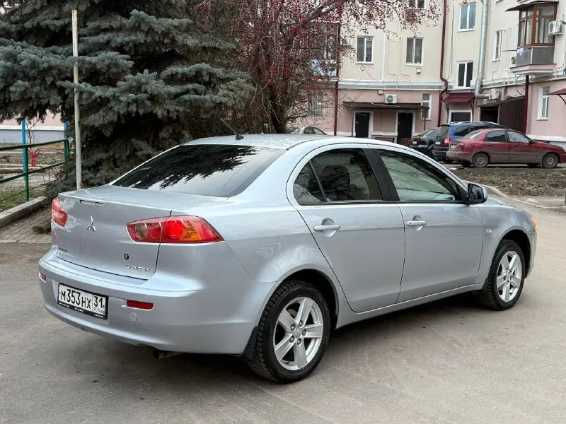 Продам mitsubishi lancer x 1.8 автомат авто в изумительном состоянии родной пробег 159 тысяч! один хозяин за всё время!! год 2009 без дтп в родном окрасе кузов без сколов и тд машина хранилась в теплом и сухом гараже! двигатель коробка ходовая в отличном состоянии максимальная комплектация под рулевые лепестки два комплекта колёс зима/лето сигнализация с автозапуском два ключа и многое другое цена 760 тыс рублей!! из за срочности +79495323651 +79496208155 - фотография - 6