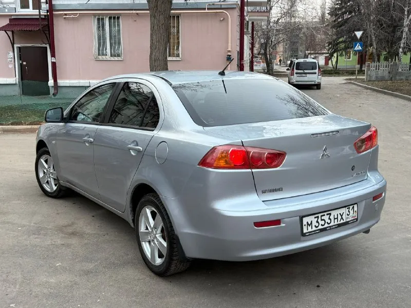 Продам mitsubishi lancer x 1.8 автомат авто в изумительном состоянии родной пробег 159 тысяч! один хозяин за всё время!! год 2009 без дтп в родном окрасе кузов без сколов и тд машина хранилась в теплом и сухом гараже! двигатель коробка ходовая в отличном состоянии максимальная комплектация под рулевые лепестки два комплекта колёс зима/лето сигнализация с автозапуском два ключа и многое другое цена 760 тыс рублей!! из за срочности +79495323651 +79496208155 - фотография - 7