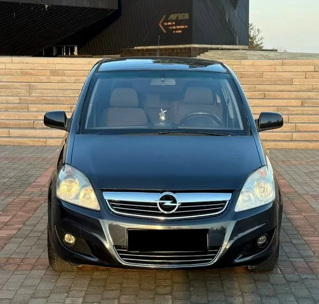 Продам opel zafira b рест! отличный 7 местный авто -2010 год -мотор 1.8 -кпп механика. -пробег: 189 000 родной пробег автомобиль в идеальном состоянии без сколов ржавчин и рыжиков все как на фото! автомобиль полностью обслужен нечего делать не нужно. мульти руль, 4 стеклоподъемника, электро легулировка зеркал, складывание зеркал, бортовой компьютер. салон чистый опрятный ухоженный. -авто юридически чист и готов к переоформлению цена: 750 000 т. руб. торг хорошему покупателю! осмотр донецк. звонить по номеру. тел: +7 (949) 594-15-39 тел: +7 (949) 589-54-40 если не дозваниватесь звоните на телеграмм 📞 звоните: +7(949)5941539 - фотография - 2