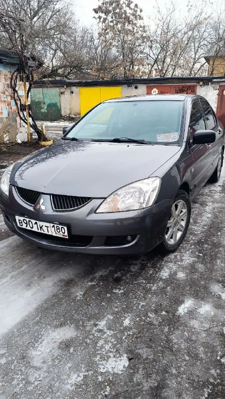 Продам автомобиль лансер девять в хорошем состоянии в машину вкладывать вообще ничего не надо сел и поехал, на интересующие воросы звоните спрашивайте. передняя полусфера стекол тонирована атермальной пленкой (по госту проходит) задняя итальянской с фиолетовым оттенком все расходники заменены полная информация что когда менялось на каком пробеге сохранена, так-же с машиной отдам стекла передних дверей затонированных в такую же плёнку как задняя часть автомобиля, стекла были поменены для перигистрация автомобиля на российские номера. 2 ключа оригинальных, 2 брелка в сигнализации с дисплеем. 79494749155 прошу 750000руб. - фотография - 2