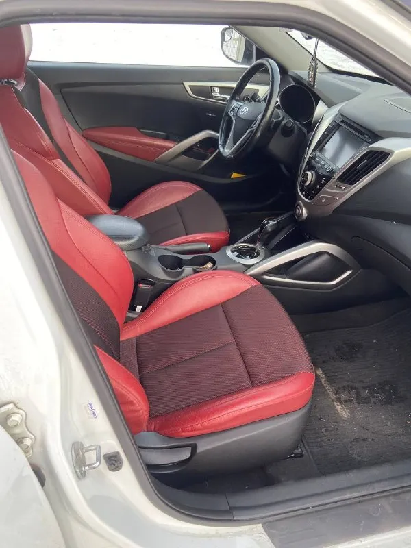 Продается hyundai veloster ! ! ! год выпуска: 2012г. двигатель: 1.6. gdi 140 л. с. пробег: 77 тыс. миль работает все, что должно работать, авто в отличном состоянии климат-контроль, система старт-стоп, без ключевой доступ, комбинированный салон, два комплекта резины. машина находится в донецке. цена 1млн.300 тыс. торг +7949-103-19-21 (владимир) 📞 звоните: +7(949)1031921 - фотография - 7