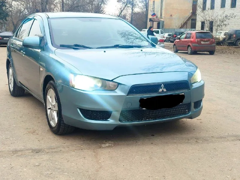 Продам авто mitsubishi lancer x 2008г в хорошем состоянии объём 1.8 ( подрулевые лепестки мульти рул... - фотография