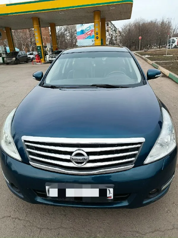 Продаётся teana ( nissan теана) 2008 года. мотор 2.5 л вариатор. пробег: 243500. комплектация: климат контроль, электро регулировка сидений с памятью, атаманка под пассажирским сиденьем, кожаный салон, абс, кнопка start/stop, бесключевой доступ, подогрев всех сидений, датчик света, складывающиеся зеркала, камера заднего вида, встроенная мультимедийная система с двд и навигатором, новая зимняя резина. машина полностью обслужена. цена: 850000. город шахтерск, тел +79494101314 📞 звоните: +7(949)4101314 - фотография - 2
