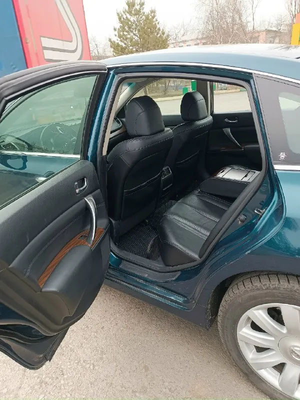 Продаётся teana ( nissan теана) 2008 года. мотор 2.5 л вариатор. пробег: 243500. комплектация: климат контроль, электро регулировка сидений с памятью, атаманка под пассажирским сиденьем, кожаный салон, абс, кнопка start/stop, бесключевой доступ, подогрев всех сидений, датчик света, складывающиеся зеркала, камера заднего вида, встроенная мультимедийная система с двд и навигатором, новая зимняя резина. машина полностью обслужена. цена: 850000. город шахтерск, тел +79494101314 📞 звоните: +7(949)4101314 - фотография - 6