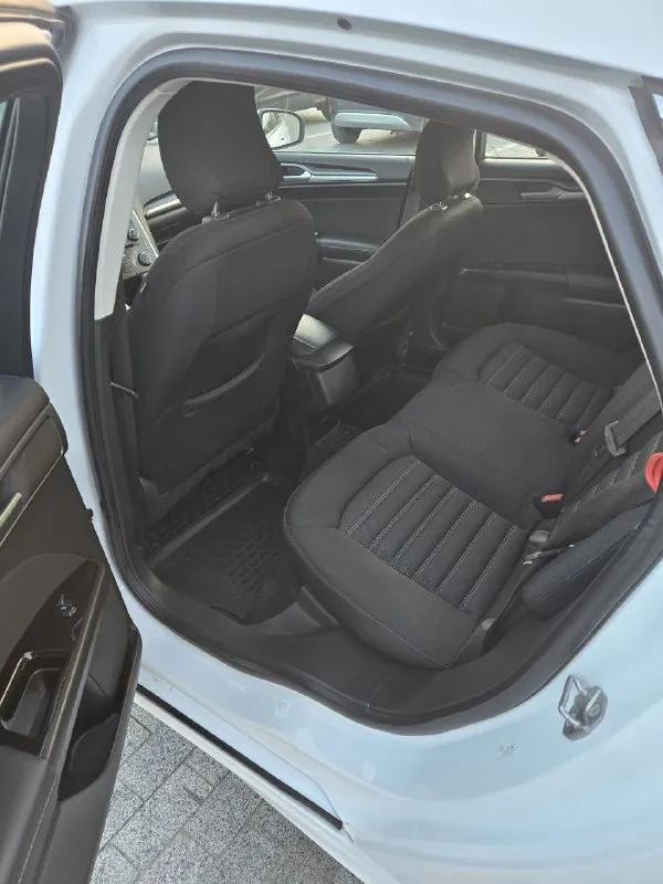 В продаже форд мондео. 2015 год, объем 2.5. пробег 117 000 родной. коробка обычный автомат. за всё время два собственника. машина в отличном состоянии, без вложений. кузов в родном окрасе. комплектация: - круиз - климат - обогрев заднего и лобового стекла - обогрев сидений - датчик давления шин - электро ручник - 4 электросклоподъемника в машине работает каждая кнопка. готов на любые проверки на вашем сто. более подробная информация по телефону. свежая диагностическая карта цена 1 250 000 тел +79495058416 - фотография - 10