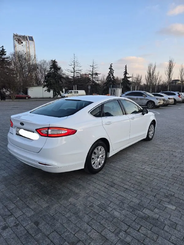 В продаже форд мондео. 2015 год, объем 2.5. пробег 117 000 родной. коробка обычный автомат. за всё время два собственника. машина в отличном состоянии, без вложений. кузов в родном окрасе. комплектация: - круиз - климат - обогрев заднего и лобового стекла - обогрев сидений - датчик давления шин - электро ручник - 4 электросклоподъемника в машине работает каждая кнопка. готов на любые проверки на вашем сто. более подробная информация по телефону. свежая диагностическая карта цена 1 250 000 тел +79495058416 - фотография - 4