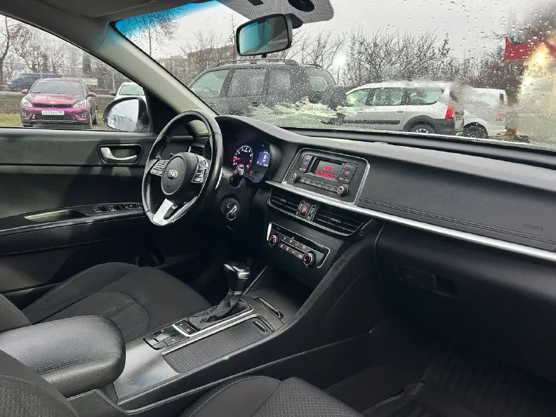 Продам kia optima iv рестайлинг 2020г 2л бензин коробка автомат aisin 1 собственник автомобиль в отличном состоянии, вид имеет шикарный, бережная эксплуатация, обслужен, вложений не требует. двигатель, коробка, техника, электрика все работает отлично, без вложений и проблем. пробег 206 тыс. км. (родной) с документами все в порядке. 💰🔥цена: 1 млн. 590 тыс. руб. осмотр г. шахтерск, торез, снежное. тел. : ☎ +7949-365-61-27 📲 tg: александр 📞 звоните: +7(949)3656127 - фотография - 7