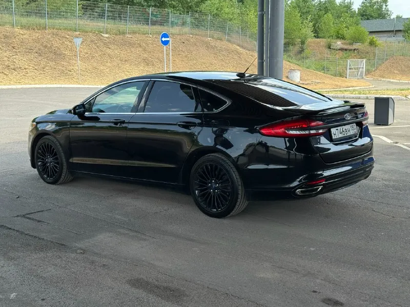 Продам ford fusion (north america) 2017г в комплектации titanium. я хозяин, на машину денег не жалел, все работает, машиной останетесь довольны. родной пробег 173 000 км двигатель 2.0 турбо на 245 л/с, работает отлично, без посторонних звуков. коробка автомат, без пинков и рывков. машина в отличном состоянии как и внешне так и технически. кондиционер заправлен, работает отлично! переоформление без проблем! машина находится в г. донецке, осмотр в любое время. цена 1 705 000р 💵 + торг реальному покупателю! +79495073003 📞 звоните: +7(949)5073003 - фотография - 3