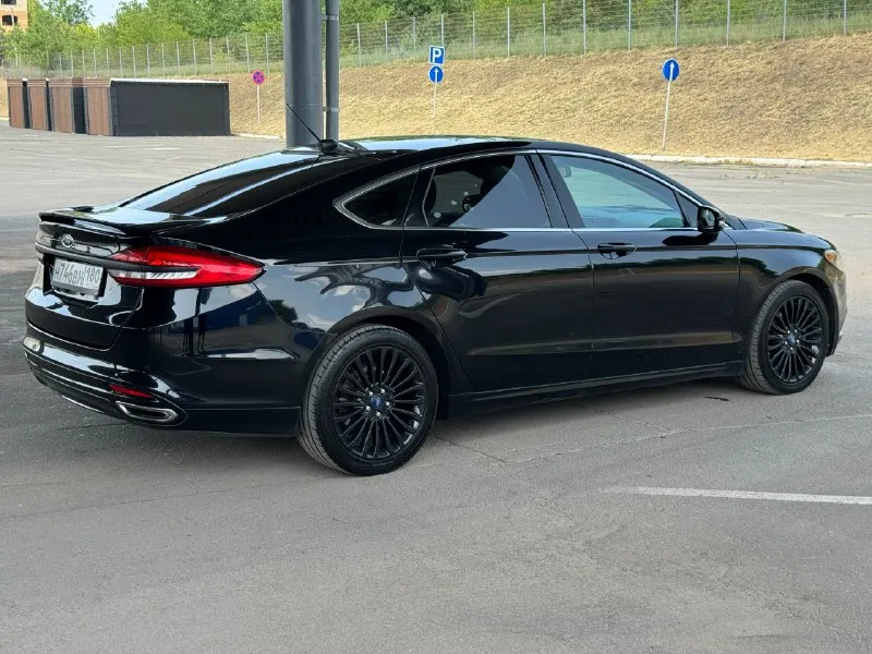 Продам ford fusion (north america) 2017г в комплектации titanium. я хозяин, на машину денег не жалел, все работает, машиной останетесь довольны. родной пробег 173 000 км двигатель 2.0 турбо на 245 л/с, работает отлично, без посторонних звуков. коробка автомат, без пинков и рывков. машина в отличном состоянии как и внешне так и технически. кондиционер заправлен, работает отлично! переоформление без проблем! машина находится в г. донецке, осмотр в любое время. цена 1 705 000р 💵 + торг реальному покупателю! +79495073003 📞 звоните: +7(949)5073003 - фотография - 5