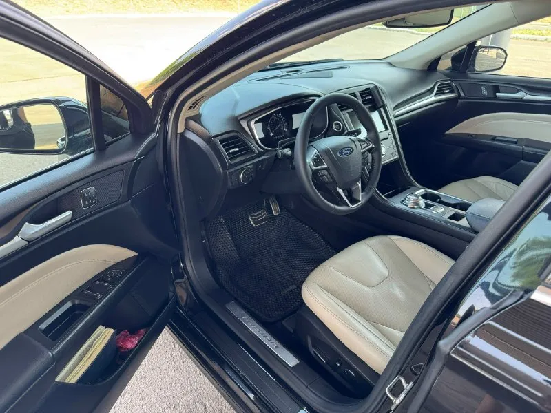 Продам ford fusion (north america) 2017г в комплектации titanium. я хозяин, на машину денег не жалел, все работает, машиной останетесь довольны. родной пробег 173 000 км двигатель 2.0 турбо на 245 л/с, работает отлично, без посторонних звуков. коробка автомат, без пинков и рывков. машина в отличном состоянии как и внешне так и технически. кондиционер заправлен, работает отлично! переоформление без проблем! машина находится в г. донецке, осмотр в любое время. цена 1 705 000р 💵 + торг реальному покупателю! +79495073003 📞 звоните: +7(949)5073003 - фотография - 8