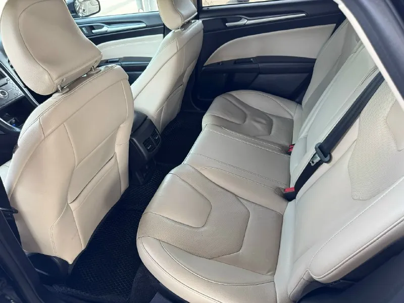 Продам ford fusion (north america) 2017г в комплектации titanium. я хозяин, на машину денег не жалел, все работает, машиной останетесь довольны. родной пробег 173 000 км двигатель 2.0 турбо на 245 л/с, работает отлично, без посторонних звуков. коробка автомат, без пинков и рывков. машина в отличном состоянии как и внешне так и технически. кондиционер заправлен, работает отлично! переоформление без проблем! машина находится в г. донецке, осмотр в любое время. цена 1 705 000р 💵 + торг реальному покупателю! +79495073003 📞 звоните: +7(949)5073003 - фотография - 9