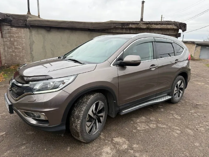 Продам автомобиль honda cr-v 4 2.4 cvt, 2015, 173 000 км своевременно обслуживался. есть сервисная книжка (авто с официального дилера). оригинальный птс. не участвовал в дтп. в салоне не курили. летняя и зимняя резина в комплекте. передняя часть авто в бронепленке, сигнализация, заменена штатная магнитола на андроид, передняя и задняя камеры. полный комплект ключей и документов. обмен не интересует. возможен торг при осмотре. телефон для связи +79493334188, телеграмм. посмотреть можно в донецке калининский район. 📞 звоните: +7(949)3334188 - фотография - 8