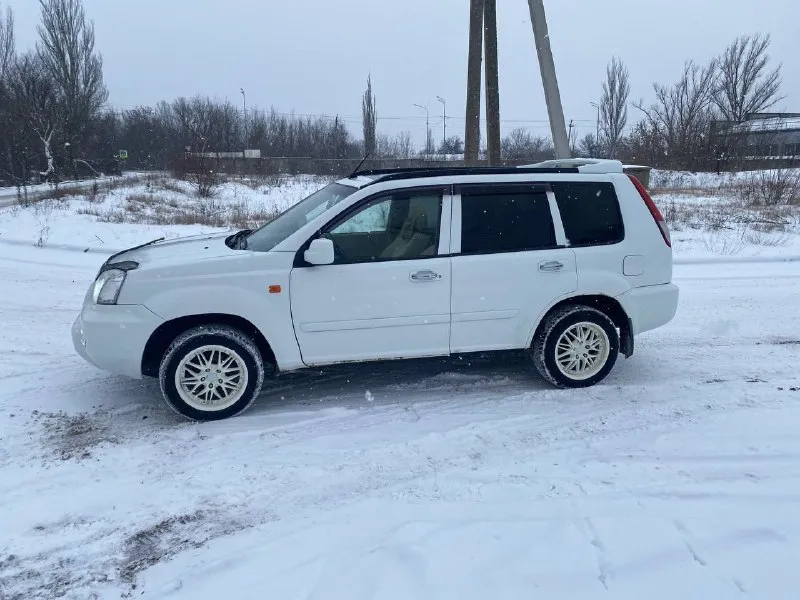Продам ниссан x-trail 2004 год мотор 2.5 коробка автомат “aisin”, привод полный, пробег 227тыс км оригинальный цена 740 ₽ автомобиль в хорошем состоянии в максимальной комплектации, газ/бензин, обслужена вся, салон в отличном состоянии без посторонних запахов и потертостей, делать ни чего не надо, сел и катайся, хорошая зимняя резина, климат контроль дует хорошо этим летом обслужили, стеклоподъемники, гидроусилитель, датчик дождя, света, погрев сидений, панорамный люк, на авто работает все, ходовая перебиралась, цепь поменяна, по мотору вопросов нет работает идеально, мягко без стуков и прочих шумов, масло не доливаю, коробка работает отлично, масло в коробке менялось каждые 40 тыс, документы в порядке машина в одних руках с автосалона покупалась в донецке новой, все вопросы по тел +79493489143 макеевка, торг уместен - фотография - 9