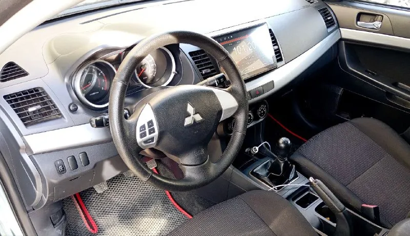 Продам mitsubishi lancer х 2011 год выпуска, рестайлинг !!! цена 685 т. р. хороший торг возле авто. осмотр донецк, ясиноватая. машина в отличном состоянии, полностью обслужена, вложений не требует абсолютно никаких (мотор и коробка в идеале), всё работает без нареканий. все расходники менялись вовремя по регламенту, делать абсолютно ничего не нужно. на момент стоит новый аккумулятор, новая резина, масло недавно поменял, обслужен и заправлен кондиционер, ходовая в полном порядке. по кузову ничего красить и делать не надо, есть антикоррозийная обработка, обесшумлена. двигатель заводится без каких-либо проблем, работает ровно, не троит, не дымит. мкпп работает отлично, ошибок на приборной панели нет. отличная комплектация: кондиционер, бортовой компьютер, сенсорная магнитола, abs, esp, иммобилайзер, airbag, подогревы сидений (2 режима), сигнализация starline, подогрев зеркал и заднего стекла, гур, стоит светодиодная оптика, серворуль. тел. : +7 (978) 555-77-28 (миранда - те 📞 звоните: +7(949)5061824 - фотография - 10