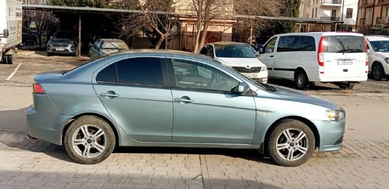 Продам mitsubishi lancer х 2011 год выпуска, рестайлинг !!! цена 685 т. р. хороший торг возле авто. осмотр донецк, ясиноватая. машина в отличном состоянии, полностью обслужена, вложений не требует абсолютно никаких (мотор и коробка в идеале), всё работает без нареканий. все расходники менялись вовремя по регламенту, делать абсолютно ничего не нужно. на момент стоит новый аккумулятор, новая резина, масло недавно поменял, обслужен и заправлен кондиционер, ходовая в полном порядке. по кузову ничего красить и делать не надо, есть антикоррозийная обработка, обесшумлена. двигатель заводится без каких-либо проблем, работает ровно, не троит, не дымит. мкпп работает отлично, ошибок на приборной панели нет. отличная комплектация: кондиционер, бортовой компьютер, сенсорная магнитола, abs, esp, иммобилайзер, airbag, подогревы сидений (2 режима), сигнализация starline, подогрев зеркал и заднего стекла, гур, стоит светодиодная оптика, серворуль. тел. : +7 (978) 555-77-28 (миранда - те 📞 звоните: +7(949)5061824 - фотография - 3
