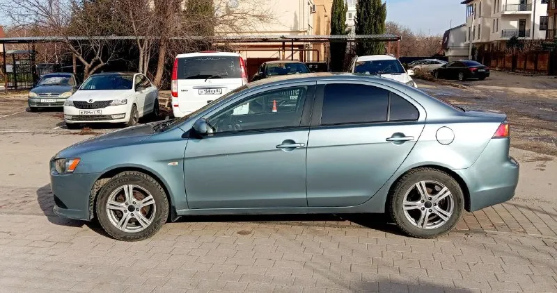 Продам mitsubishi lancer х 2011 год выпуска, рестайлинг !!! цена 685 т. р. хороший торг возле авто. осмотр донецк, ясиноватая. машина в отличном состоянии, полностью обслужена, вложений не требует абсолютно никаких (мотор и коробка в идеале), всё работает без нареканий. все расходники менялись вовремя по регламенту, делать абсолютно ничего не нужно. на момент стоит новый аккумулятор, новая резина, масло недавно поменял, обслужен и заправлен кондиционер, ходовая в полном порядке. по кузову ничего красить и делать не надо, есть антикоррозийная обработка, обесшумлена. двигатель заводится без каких-либо проблем, работает ровно, не троит, не дымит. мкпп работает отлично, ошибок на приборной панели нет. отличная комплектация: кондиционер, бортовой компьютер, сенсорная магнитола, abs, esp, иммобилайзер, airbag, подогревы сидений (2 режима), сигнализация starline, подогрев зеркал и заднего стекла, гур, стоит светодиодная оптика, серворуль. тел. : +7 (978) 555-77-28 (миранда - те 📞 звоните: +7(949)5061824 - фотография - 6