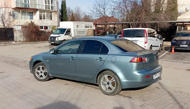 Продам mitsubishi lancer х 2011 год выпуска, рестайлинг !!! цена 685 т. р. хороший торг возле авто. осмотр донецк, ясиноватая. машина в отличном состоянии, полностью обслужена, вложений не требует абсолютно никаких (мотор и коробка в идеале), всё работает без нареканий. все расходники менялись вовремя по регламенту, делать абсолютно ничего не нужно. на момент стоит новый аккумулятор, новая резина, масло недавно поменял, обслужен и заправлен кондиционер, ходовая в полном порядке. по кузову ничего красить и делать не надо, есть антикоррозийная обработка, обесшумлена. двигатель заводится без каких-либо проблем, работает ровно, не троит, не дымит. мкпп работает отлично, ошибок на приборной панели нет. отличная комплектация: кондиционер, бортовой компьютер, сенсорная магнитола, abs, esp, иммобилайзер, airbag, подогревы сидений (2 режима), сигнализация starline, подогрев зеркал и заднего стекла, гур, стоит светодиодная оптика, серворуль. тел. : +7 (978) 555-77-28 (миранда - те 📞 звоните: +7(949)5061824 - фотография - 7