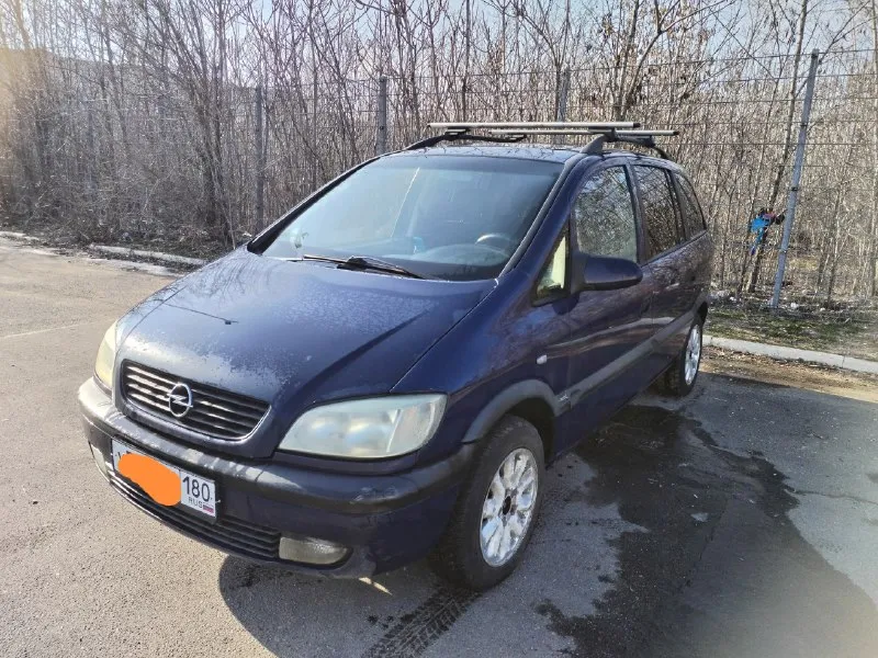 Продам opel зафира а opel zafira a я хозяин 180учет 2001 год 7 мест салон трансформер 1.8 бензин коробка механика, работает отлично ходовая в норме, кондиционер работает, печка новая греет, кузов для своих лет выглядит хорошо каталась исключительно в южных регионах с документами полный порядок/ переоформление 460т₽ осмотр в донецке +79494132009 📞 звоните: +7(949)4132009 - фотография - 2