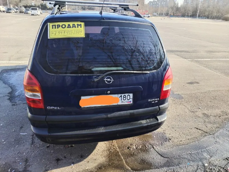 Продам opel зафира а opel zafira a я хозяин 180учет 2001 год 7 мест салон трансформер 1.8 бензин коробка механика, работает отлично ходовая в норме, кондиционер работает, печка новая греет, кузов для своих лет выглядит хорошо каталась исключительно в южных регионах с документами полный порядок/ переоформление 460т₽ осмотр в донецке +79494132009 📞 звоните: +7(949)4132009 - фотография - 3