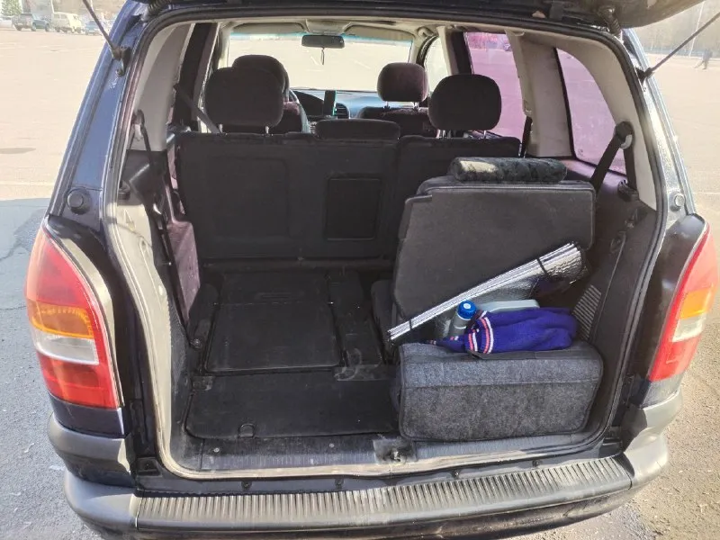 Продам opel зафира а opel zafira a я хозяин 180учет 2001 год 7 мест салон трансформер 1.8 бензин коробка механика, работает отлично ходовая в норме, кондиционер работает, печка новая греет, кузов для своих лет выглядит хорошо каталась исключительно в южных регионах с документами полный порядок/ переоформление 460т₽ осмотр в донецке +79494132009 📞 звоните: +7(949)4132009 - фотография - 6